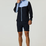 Reprimo Flight Windbreaker in black and dusky sky with zip pockets and breathable back vent, lightweight polyamide jacket for wind and light rain protection