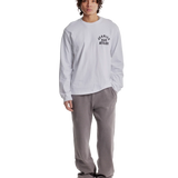 Jeanius Bar Atelier varsity long sleeve white and black t-shirt with vintage wash and relaxed fit