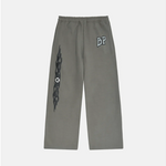 Broken Planet Gunmetal Grey wide-leg sweatpants with graphic design.