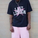 Last Lesson All-Star black t-shirt with bold graphic design.