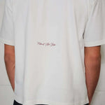 Natural Art Studio white cotton boxy fit tee with red back logo print.