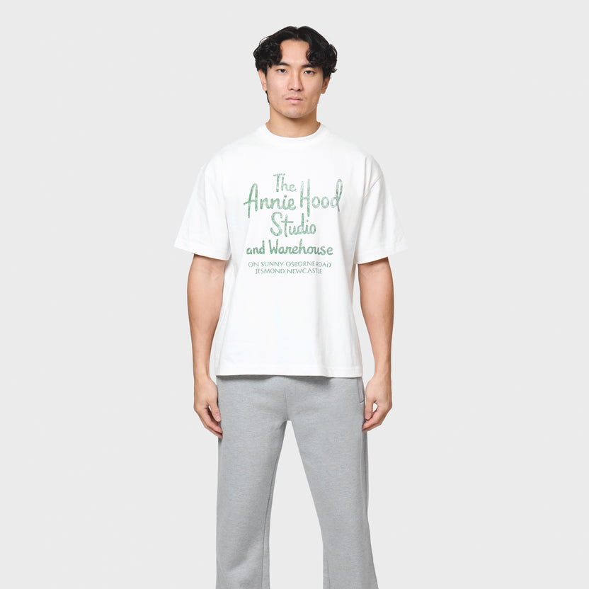 Annie Hood Factory T-shirt in white, 280gsm cotton, relaxed fit worn by 6'0" model in size M