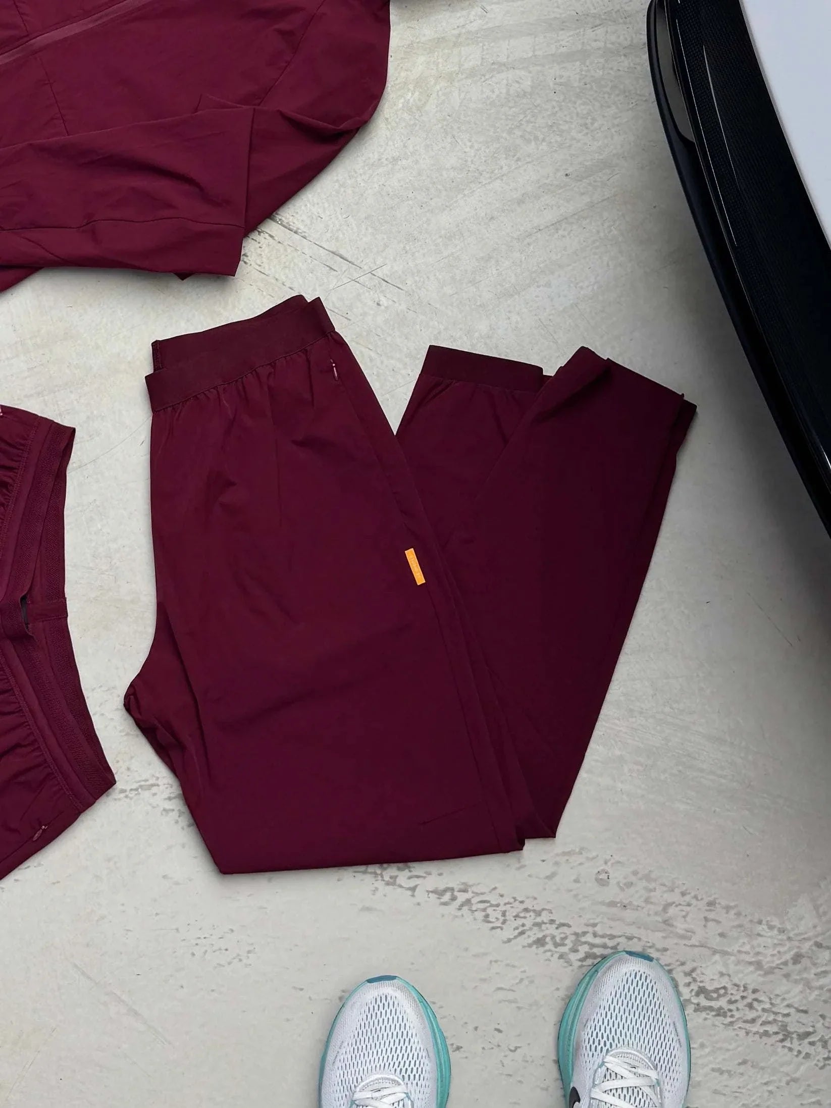 Studio By Charles burgundy trackpant with elastic waistband and side pockets