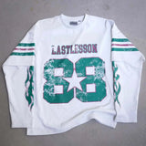 White Last Lesson Double Sleeve Jersey with green and red accents.