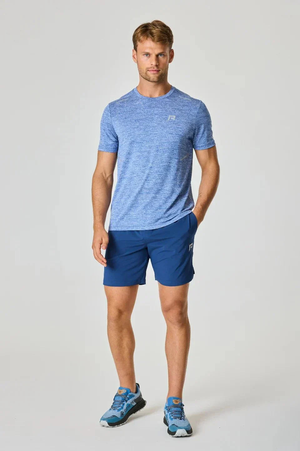Reprimo Pulse Shorts in Indigo worn by model.