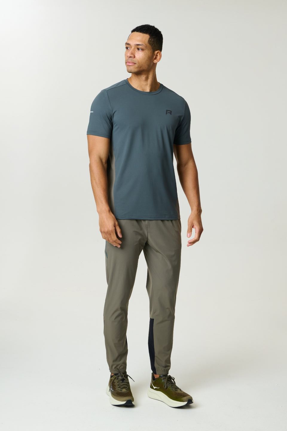 Reprimo Vortex Pants in dark moss and grey velvet with ergonomic panels and adjustable waistband.