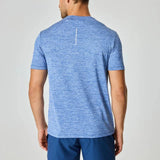 Reprimo Pulse T-Shirt in indigo worn by a man, back view.