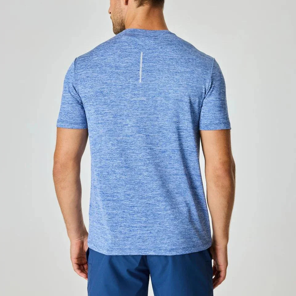 Reprimo Pulse T-Shirt in indigo worn by a man, back view.