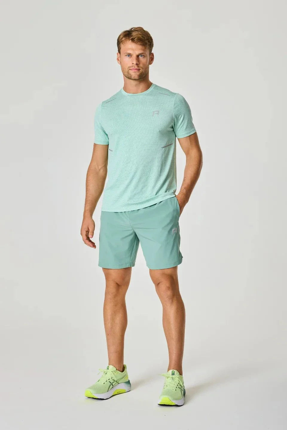 Reprimo Pulse Shorts in Seafoam on male model.