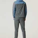 Man wearing Reprimo Flight Windbreaker in Air Force Blue and Gunmetal with hood and zip pockets, shown from back