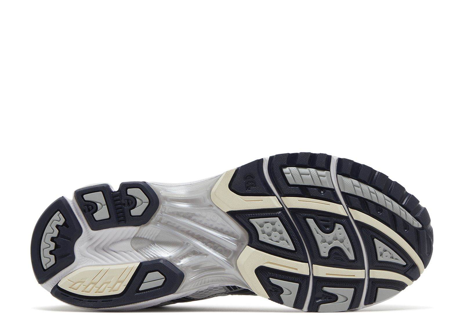 Wmns Gel Kayano 14 running shoe outsole in white and midnight colors