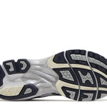 Wmns Gel Kayano 14 running shoe outsole in white and midnight colors