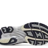 Wmns Gel Kayano 14 running shoe outsole in white and midnight colors