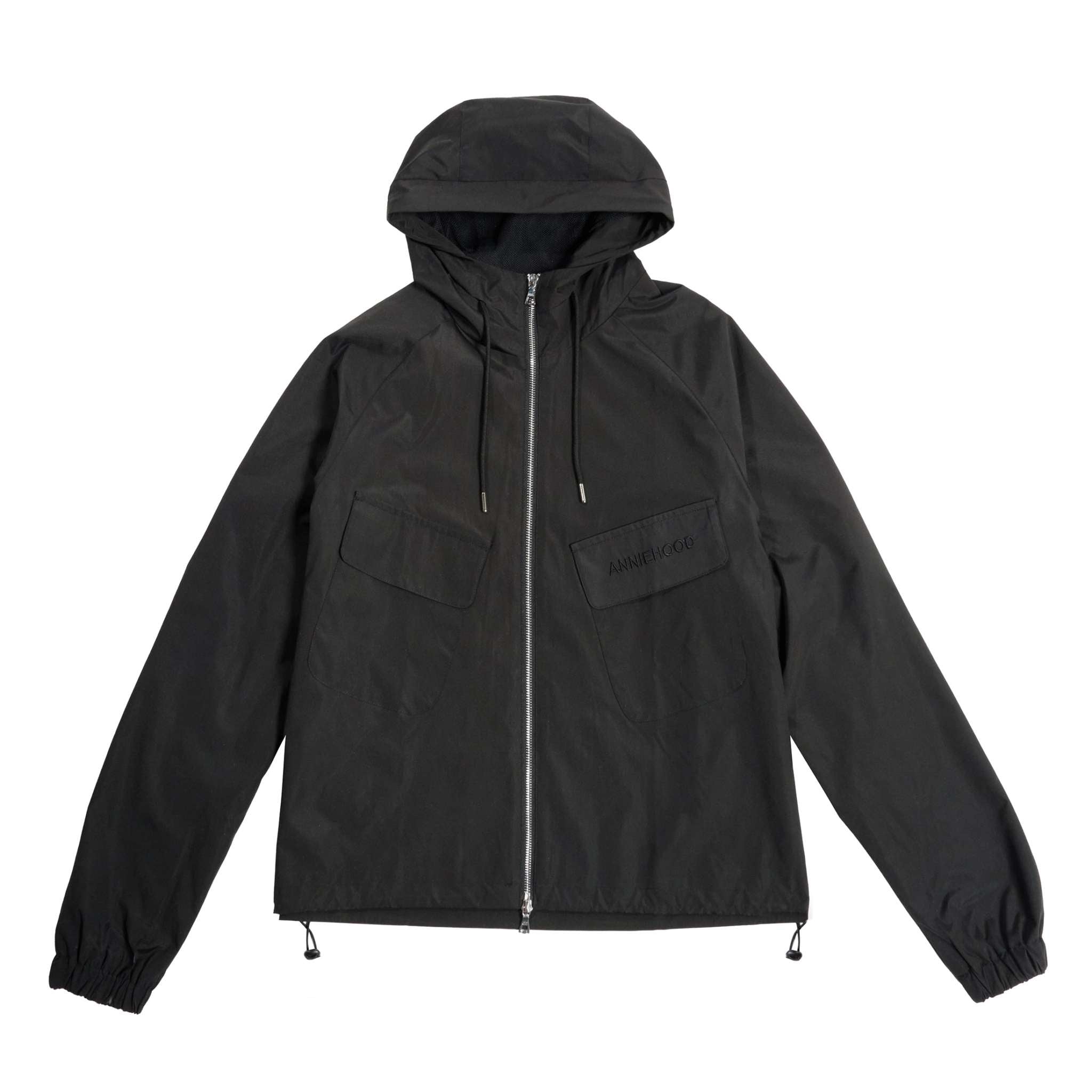 Black nylon jacket with hood, large pockets, dual zipper, and adjustable waist by ANNIE HOOD.