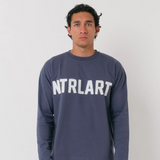 Natural Art Studio navy long sleeve cotton top with distressed appliqué logo and boxy fit