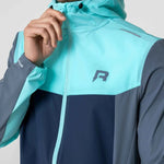 Reprimo Flight windbreaker in cyan and navy.