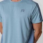 Reprimo Nova T-Shirt in Aqua/Dusk Blue worn by a model.