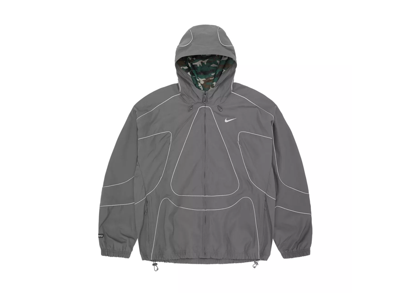 Corteiz x Nike NRG Jacket in Gully Grey with hooded design and distinctive pattern.