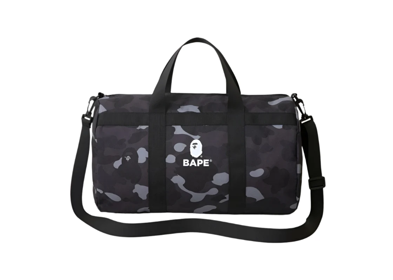 Bape Duffle Bag in black camo design with shoulder strap.