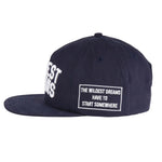 Wildest Dreams Varsity Cap navy with white embroidered text and patch