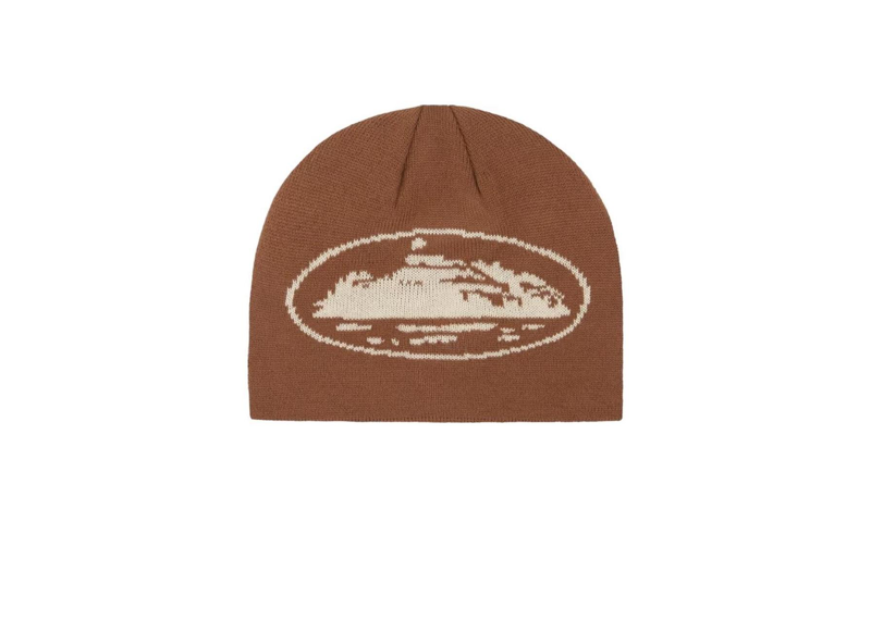 Corteiz Alcatraz Beanie Brown hat with oval design.