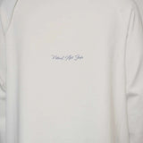 Natural Art Studio white cotton long sleeve shirt with distressed appliqué and screen print logo