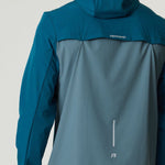 Reprimo Flight Windbreaker in tidal teal and blue steel with lightweight, durable fabric and back vent for ventilation