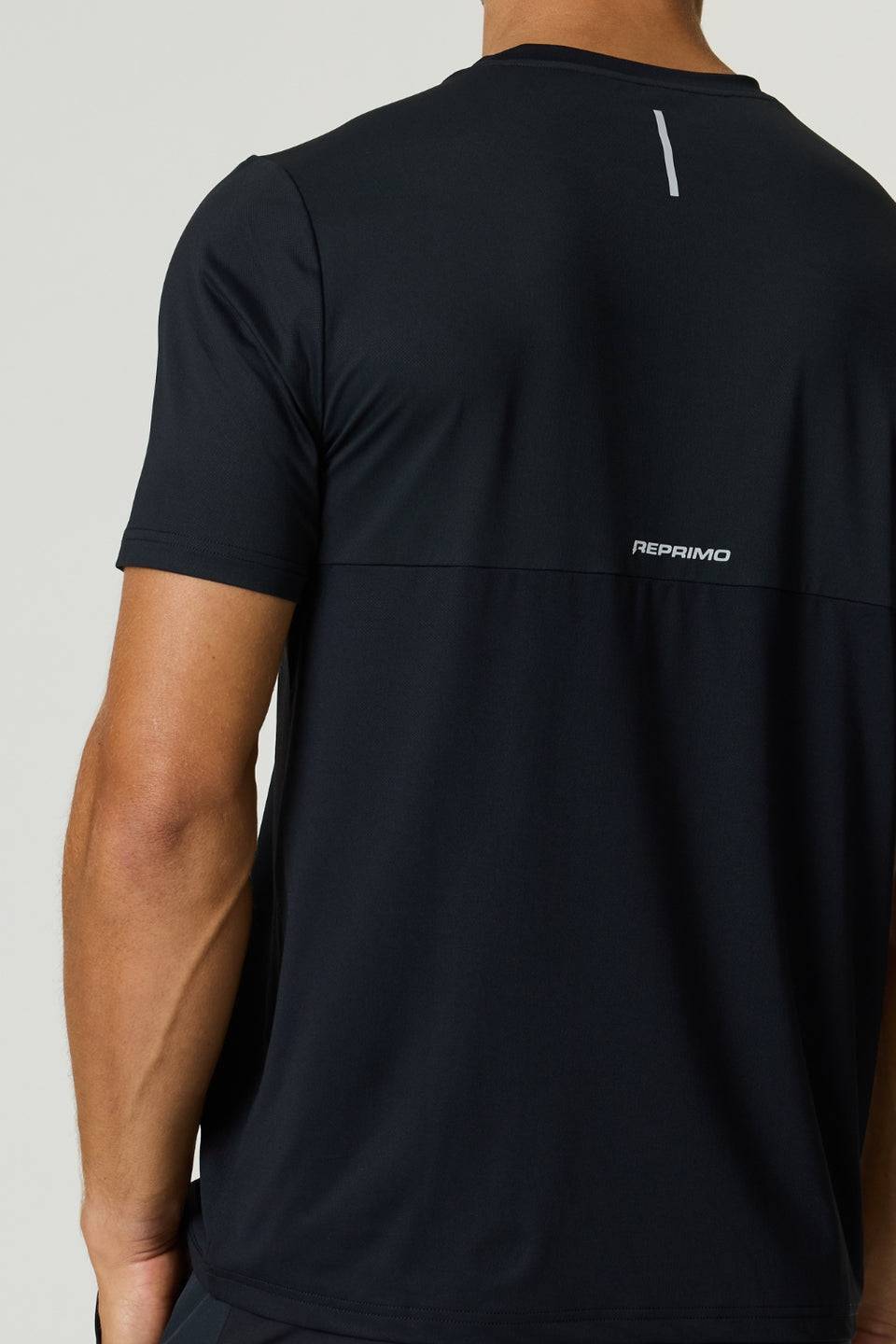 Reprimo Flight T-Shirt black athletic fit breathable fabric with reflective strip on back