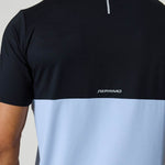 Back view of Reprimo Flight T-Shirt in black and dusky sky colors with reflective strip and logo
