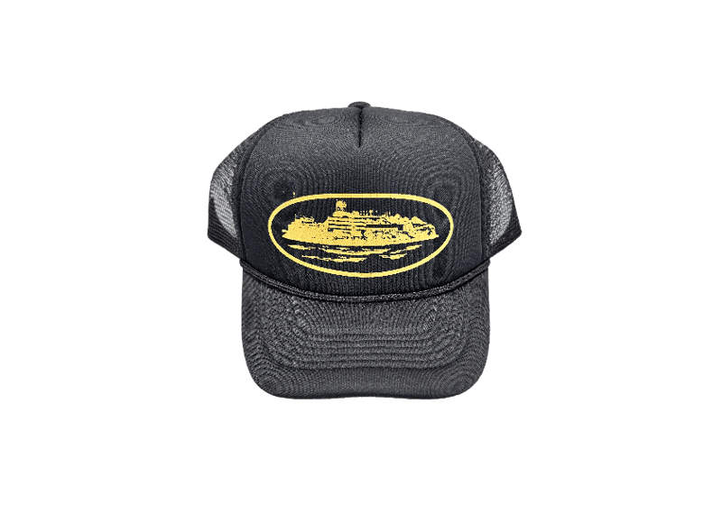 CORTEIZ ALCATRAZ Trucker Hat in Black and Yellow featuring a graphic design.