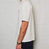 Natural Art Studio oversized boxy fit white cotton tee with red logo print on front and back