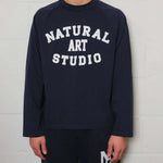Navy Natural Art Studio raglan long sleeve shirt with front screen print logo, 100% cotton, boxy fit