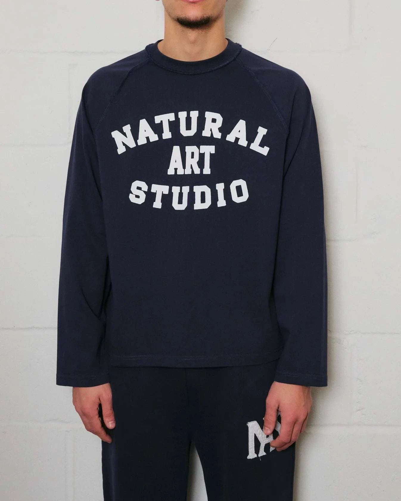 Navy Natural Art Studio raglan long sleeve shirt with front screen print logo, 100% cotton, boxy fit