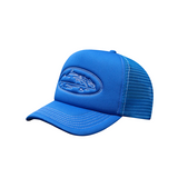 Blue Corteiz Island outline trucker hat displayed on a white background