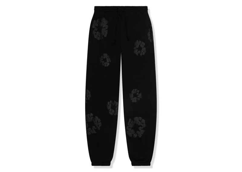 DENIM TEARS Cotton Wreath Sweatpants in Black Monochrome.