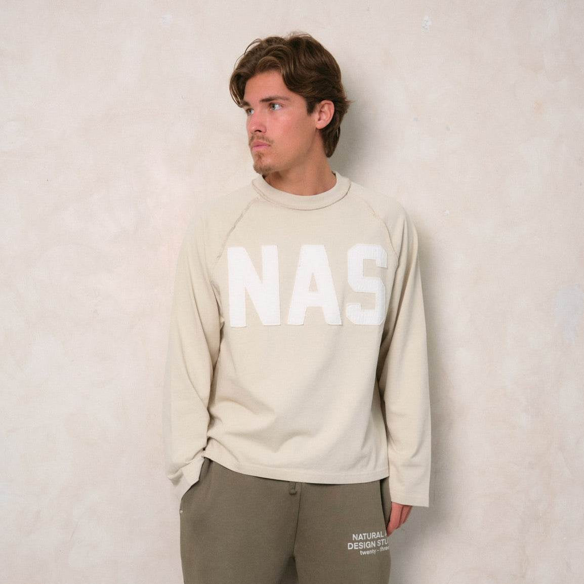 Natural Art Studio boXY fit cotton long sleeve with distressed appliqué front logo and screen print back