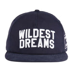 Navy and white Wildest Dreams Varsity Cap with embroidered text