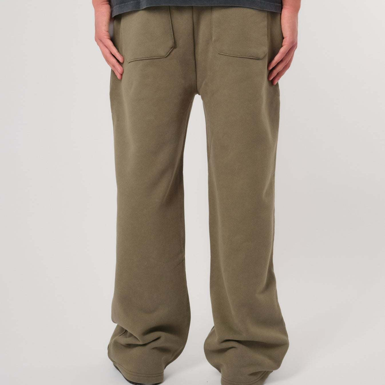 Natural Art Studio vintage wash green sweatpants with faded logo and elastic waistband