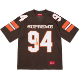 Brown Supreme Sequin Football Jersey with number 94 and orange accents