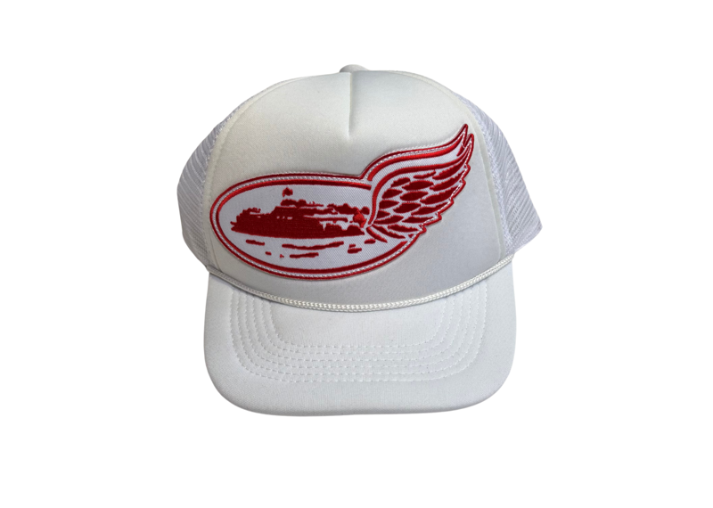 Corteiz Alcatraz Wing Trucker Hat in white with red wing design.