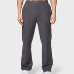 ANNIE HOOD COLLEGE JOGGERS in washed black, 500gsm brushback cotton, relaxed fit, modeled by 6'0" model with 31 waist wearing size M