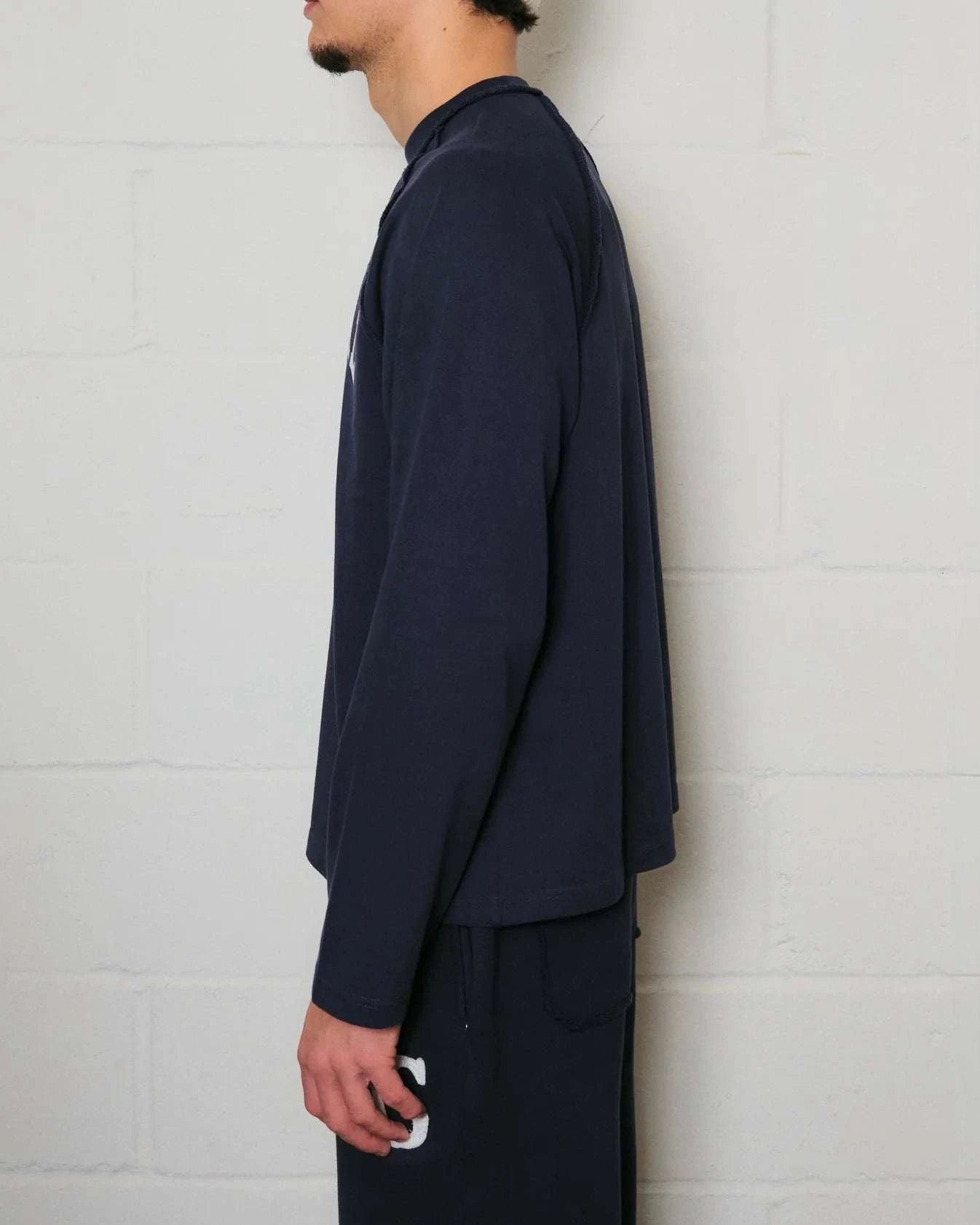 Natural Art Studio navy raglan long sleeve cotton shirt with inside out seams and front-back logo print