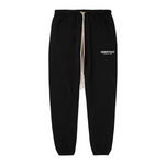 Black Fear of God Essentials fleece sweatpants with beige drawstring and logo print