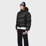 Annie Hood Hood Puffer jacket with 100% nylon outer and down filling, rain resistant, model wearing size M at 6'0 tall