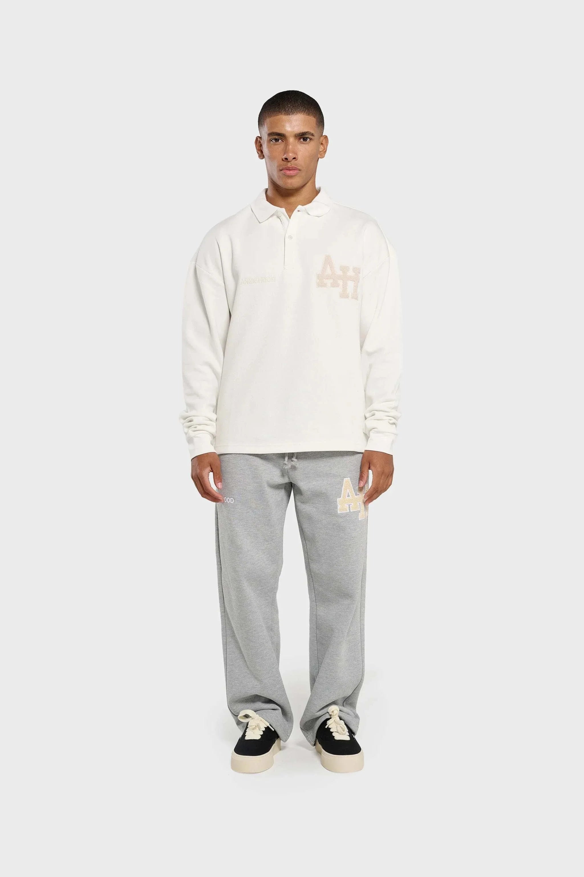 White Annie Hood College polo shirt with double embroidery logo on ribbed cotton