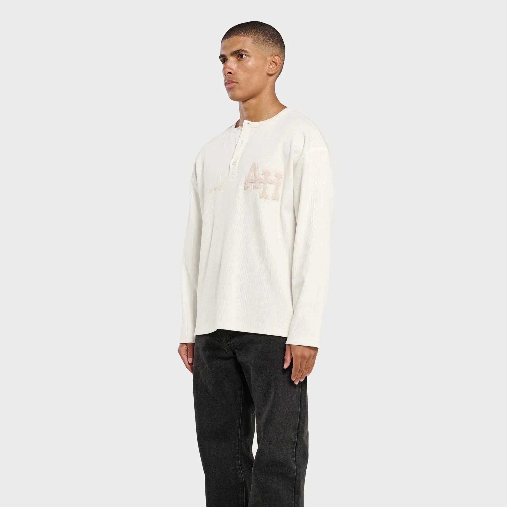Annie Hood College Henley white ribbed cotton shirt with double embroidery logo worn oversized