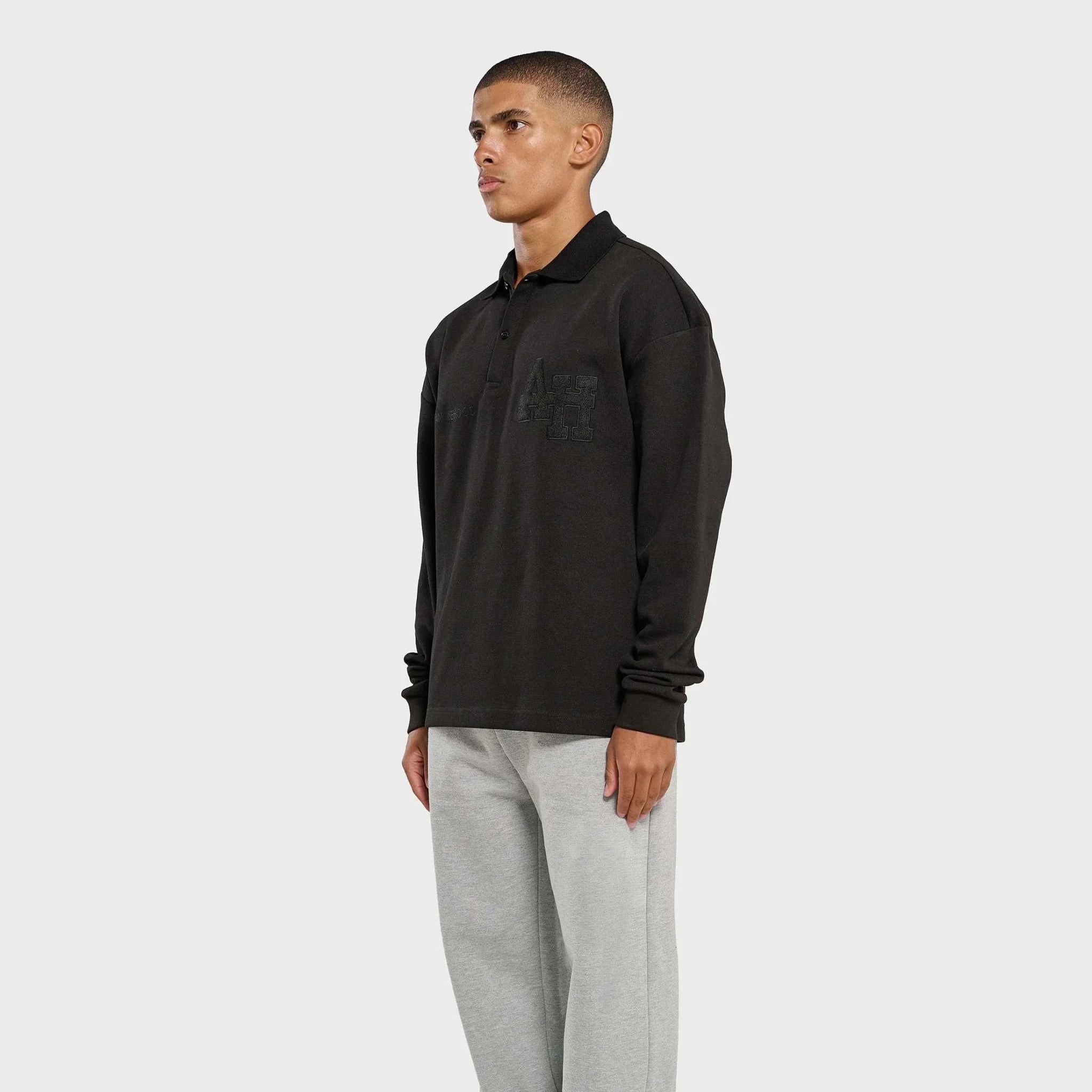 Black Annie Hood College polo shirt with double embroidery logo on ribbed cotton