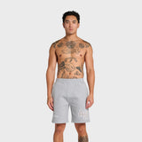 Man wearing grey ANNIE HOOD college shorts with elastic waistband against plain background