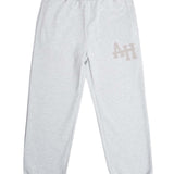 ANNIE HOOD College Joggers Grey with double embroidery logos, crafted from premium cotton fleece.