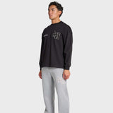 Black ANNIE HOOD L/S COLLEGE T-SHIRT with dropped shoulder and boxy fit featuring embroidery details